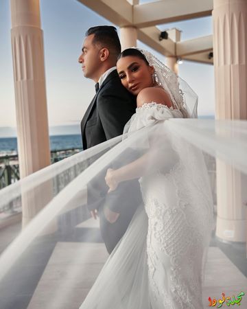 صورة جوري بكر وزوجها بفستان الزفاف